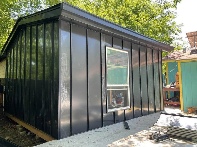 Black standing seam metal wall panels for Roof Inspection in Demarest